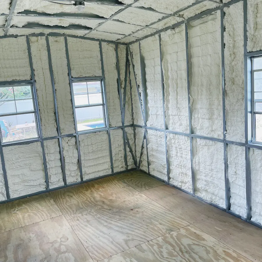 Closed-cell spray foam insulation applied to wall cavities in a residential project in Happy Valley